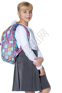 背包旅行女孩上学了学生童年微笑孩子家庭女儿背包小学生白色学习背景