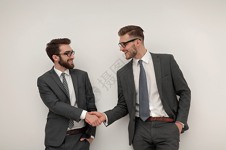 两个商界人士的握手套装男人手势会议合同商业顾客商务友谊伙伴图片