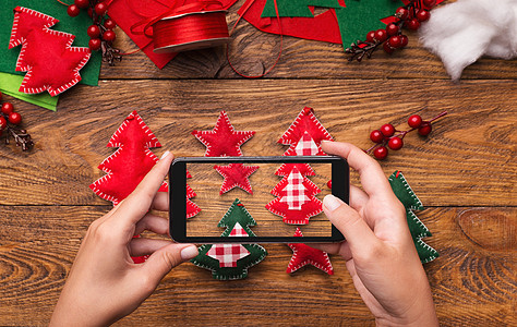 圣诞节手机新年博客在木木背景上的移动照片背景