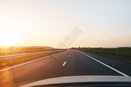 黎明时空高速公路 从司机的角度看运输太阳旅行日出运动国家沥青阳光土地场景图片