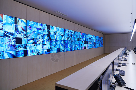 大型现代安保系统控制室的空内置安全系统控制室电话警报数据展示控制板办公室工作站椅子机构视频图片
