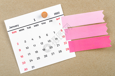 2022年1月的日历 上面有空白胶纸纸别针办公用品办公室数字空间便利贴英语假期笔记活动图片