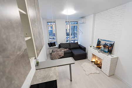 拥有开放的厨房和客厅的当代公寓地面木头窗帘建筑学软垫台面枕头烤箱装饰椅子图片