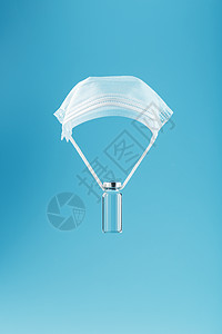 使用抗病毒疫苗的安普勒和以保护性美食油制成的蓝底薄膜上的一种小羊绒上的疾病帮助临床商业天空降落伞实验室服务医生感染空气图片