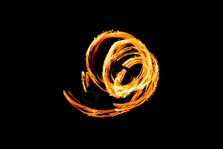 火光耀眼的火焰运动 夜间性能摘要绘制马戏团黑色燃烧文化漩涡舞蹈圆圈观众小径背景图片