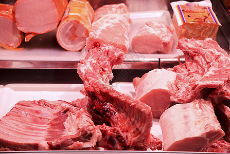 在阿利坎特中央市场内的肉摊消费者冰箱店铺销售杂货店站立产品饮食鱼片陈列柜图片