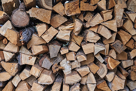 木柴堆成背景 砍碎的木柴堆 缝合图片