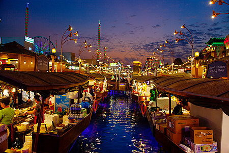 迪拜全球村夜光和水透视访客城市照明乐趣展览公园装饰购物建筑学村庄图片