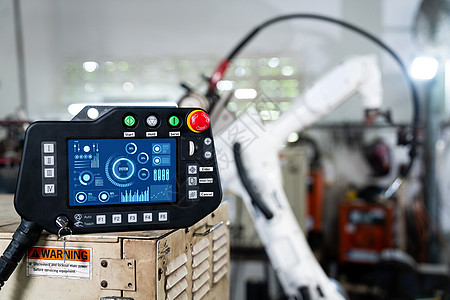 机械臂及其在工厂车间的控制器天顶板机械软件控制编码操作包装制造业汽车工程产品图片