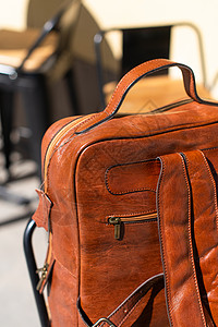 橙色皮革背包橙子材料拉链质量棕色隐藏公文包行李旅行带子图片