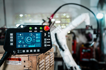 机械臂及其在工厂车间的控制器天顶板自动化软件制造业包装电脑机械生产输送带科学控制板图片