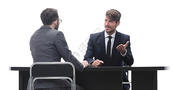 两名商业人士坐在办公桌旁交谈工作生意人战略合伙合同职业咨询面试讨论会议图片