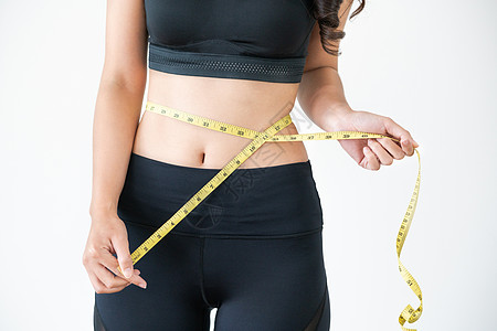 近身射手 身材瘦弱的女子女孩橘皮磁带测量重量女性食物身体组织训练图片