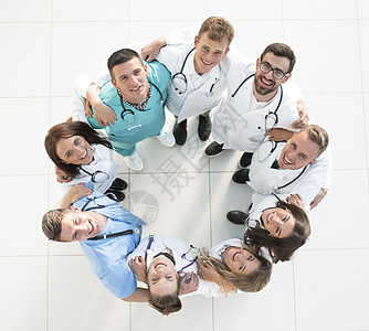 医疗队站在圆圈中护士男人女士医生同事医疗保健团队护理人员职员友谊图片