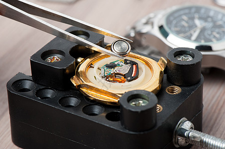 替换钟表电池释放发条电压修理工业活力服务设备工具替代品图片