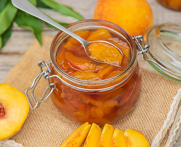 保存桃果酱 有选择的焦点 食物油桃烹饪早餐厨房营养空白玻璃健康水果勺子图片