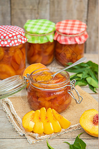 保存桃果酱 有选择的焦点 食物健康桌子早餐饮食油桃花园玻璃桃子水果勺子图片
