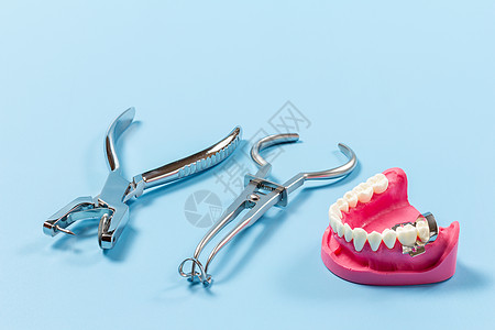 一套用于牙齿牙科护理的金属牙牙床工具治疗牙医探险家口腔科围堰夹钳矫正医疗橡皮诊所图片