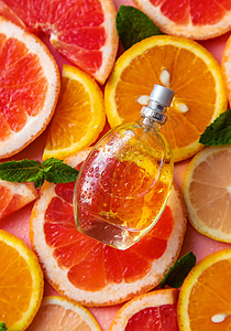 含柑橘提取物的香水 选择性焦点 温泉香气树叶化妆品桌子治疗玻璃滴管按摩柚子皮肤图片