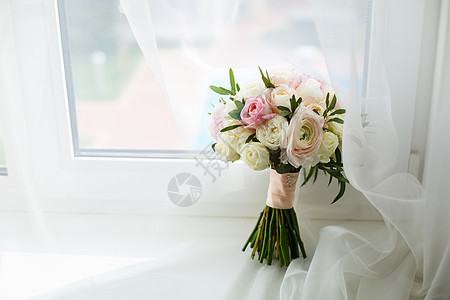 新娘用鲜花献给新娘的布束传统订婚植物礼物庆典花店婚姻花束仪式浪漫图片