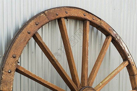 金属本底的古董木制车轮国家历史性圆圈农村栅栏辐条历史运动木材木头图片