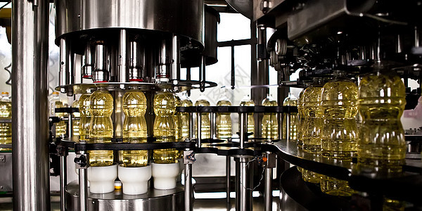 生产食用油的工厂 浅色DOFF 乌克兰技术工作瓶子行动输送带种子烹饪植物运动生产线图片