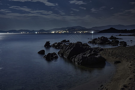 夜间撒丁岛海滩海浪假期支撑蓝色海洋旅游场景日落岩石天空图片