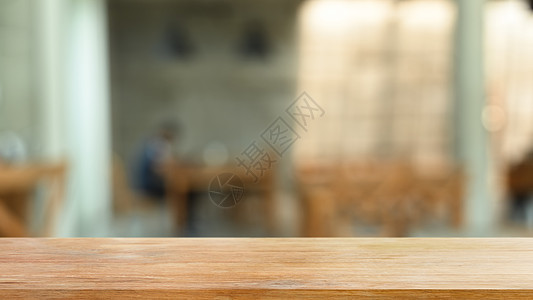 餐饮背景模糊的空木板或架子 供您展示产品使用图片