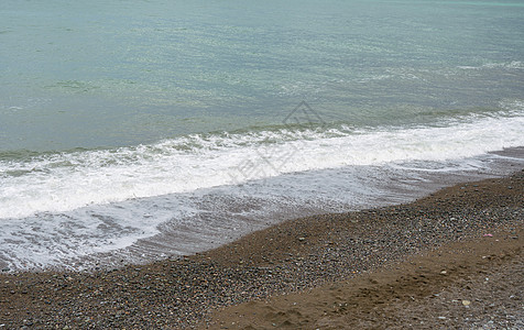 风雨如磐海岩模糊热闹的高清图片