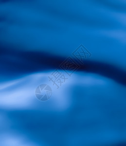 蓝色抽象艺术背景 丝绸纹理和波浪线 用于经典豪华设计线条奢华美丽假期海浪问候新年面纱品牌推广图片