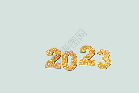 数字 2023 金色亮点是未来新年的象征 顶视图 复制空间图片