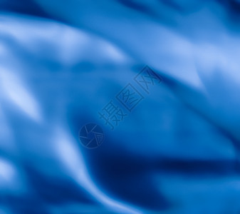 蓝色抽象艺术背景 丝绸纹理和波浪线 用于经典豪华设计展示投标推广织物美丽新年奢华品牌窗帘销售背景图片