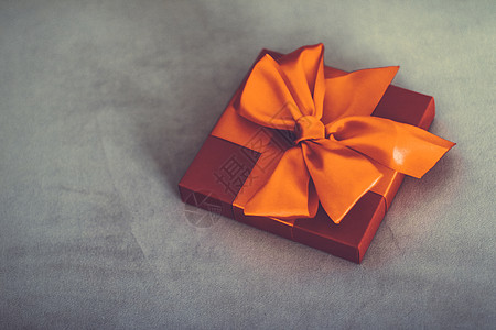 带有丝带和弓 圣诞节或情人节日装饰品的古老豪华假日橙色礼品盒橙子婚礼假期展示庆典女性购物圣诞礼物奢华新年图片
