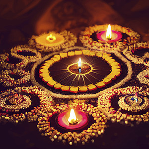 在庆祝diwali时在彩色兰果里点燃石油灯的插图文化假期宗教庆典节日图片