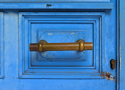 蓝把手门生铁柄戒指入口门把手木头房子金属蓝色古董建筑学图片