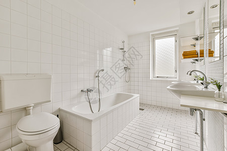 带有洗手池和浴缸的白色浴室公寓水龙头木头窗户房子卫生龙头建筑学桌子奢华图片