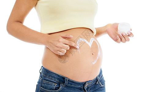 孕妇 腹部和奶油与心脏 白色背景和身体化妆品 护肤 妊娠胃和妊娠纹乳液 美学健康和工作室美容的健康孕产图片