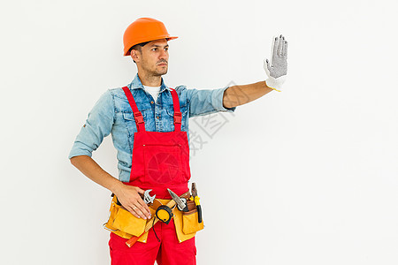 建筑工人身着制服和安全设备 在大楼里工作; 在建筑物中从事工事图片