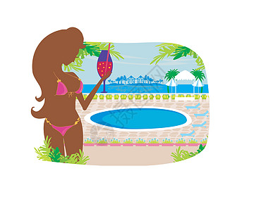 女孩在热带游泳池饮酒图片