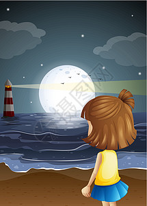 一个小女孩在沙滩上 看着灯塔图片