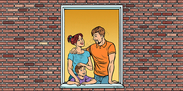 一个年轻的家庭 在房子的窗户里有一个男孩图片