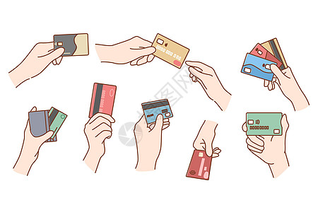 一组人持有信用卡在线付款 并持有信用卡图片