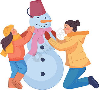 妈妈和孩子一起做雪人 传统冬季活动图片