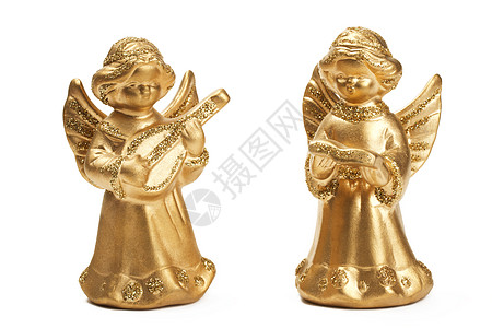 两位金色的圣诞天使雕像 作为音乐家图片