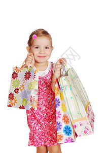 带购物袋的快乐小女孩图片