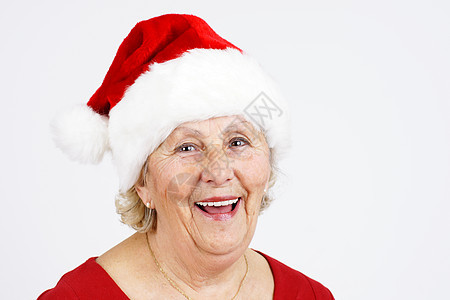 圣诞帽子奶奶笑着微笑背景图片