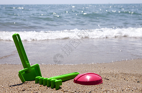 塑料沙滩玩具 蓝色的 孩子 海洋 假期 晴天 铲背景
