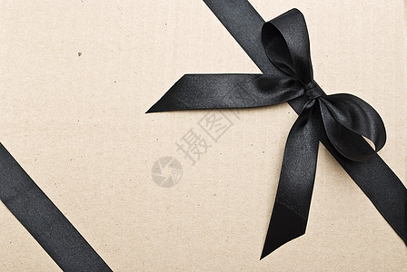 纸板背面的黑边带和弓 生日 展示 念日 假期 包装图片