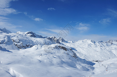 冬季山地降雪 蓝色的 高的 太阳 宁静 顶峰 白色的图片