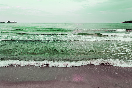 沙沙滩上的海浪 假期 海滩 水 海滨 天空 运动 自然图片